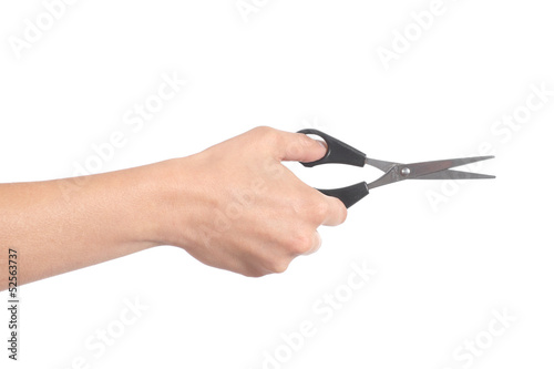 Woman hand using a scissors