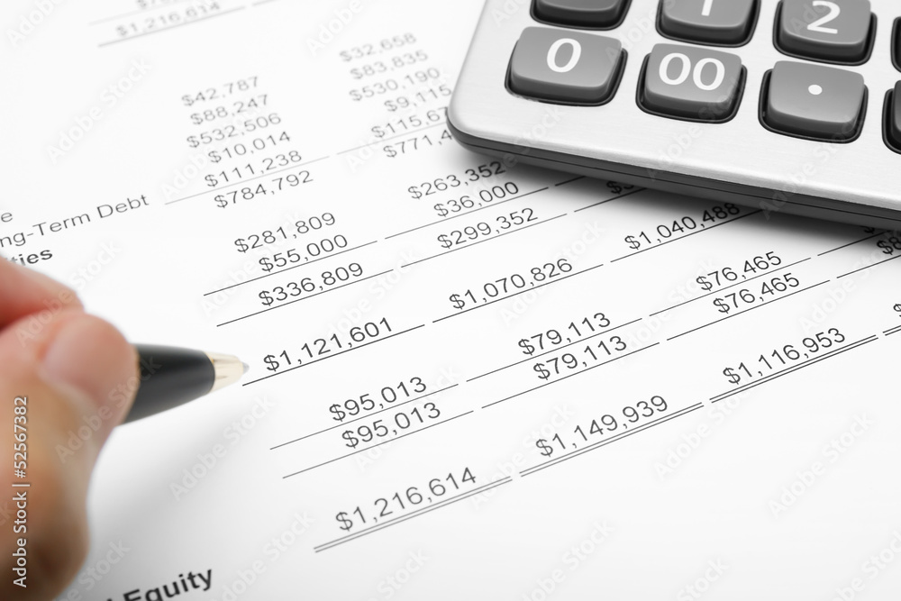 business financial chart analysis with calculator, pen & hand business financial chart analysis with calculator, pen & hand