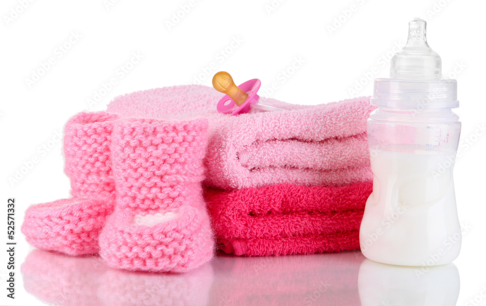 Bottle for milk with towels and nipple isolated on white Bottle for milk with towels and nipple isolated on white
