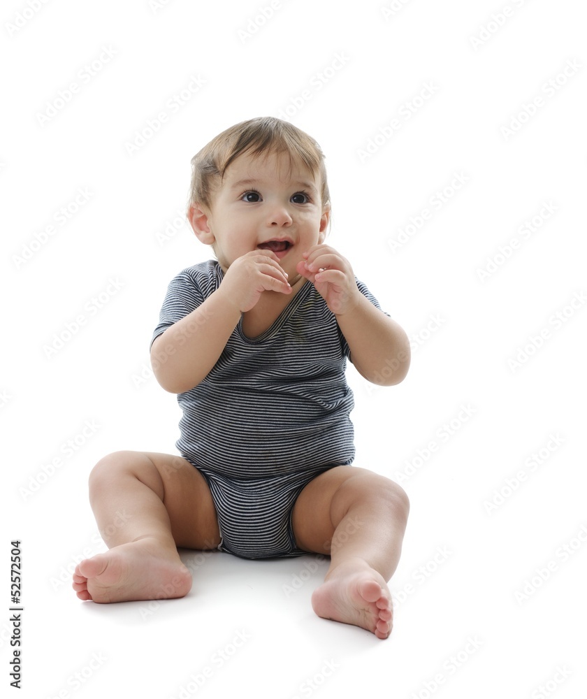 Baby is sitting on floor, isolated on white Baby is sitting on floor, isolated on white