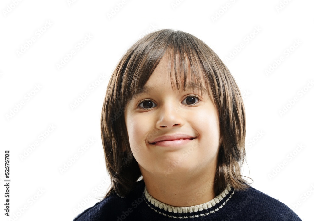 Close up portrait of a kid smiling to the camera Close up portrait of a kid smiling to the camera