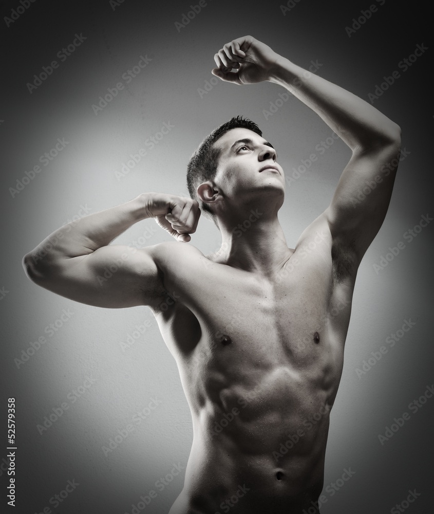 Obraz premium Young sexy muscular man posing