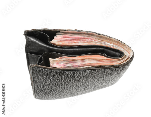 Leather wallet with money isolated on white background