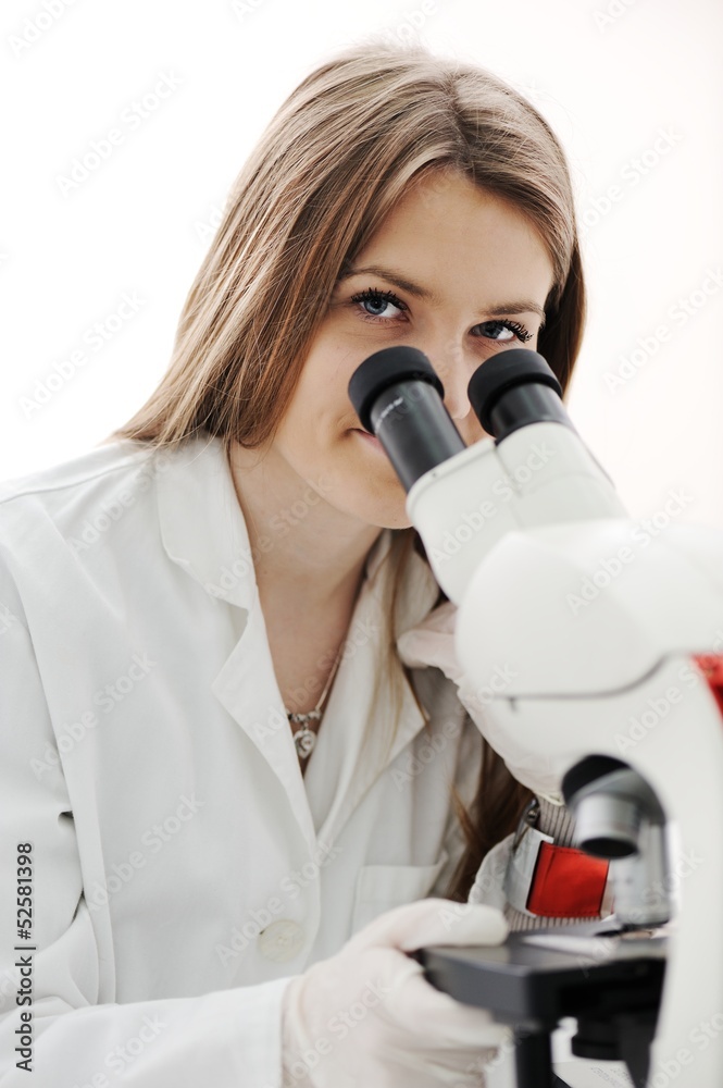 Young science workers research at medical lab Young science workers research at medical lab