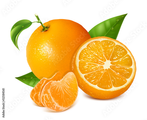 Fresh oranges fruits with green leaves and slices