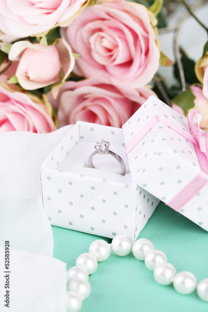 Ring on a wooden background Ring on a wooden background
