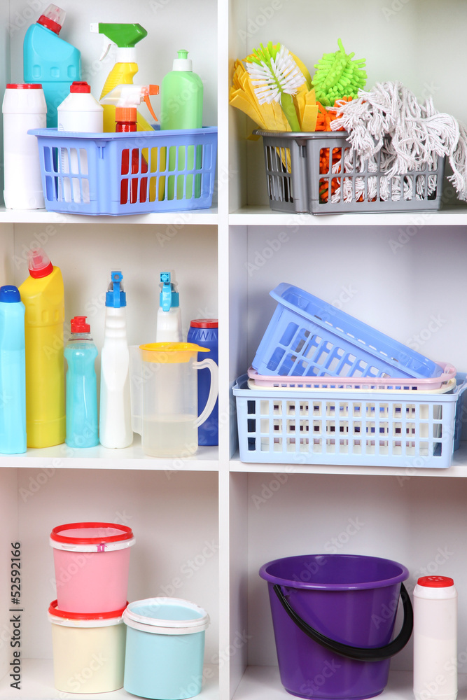 Shelves in pantry with cleaners for home close-up Shelves in pantry with cleaners for home close-up