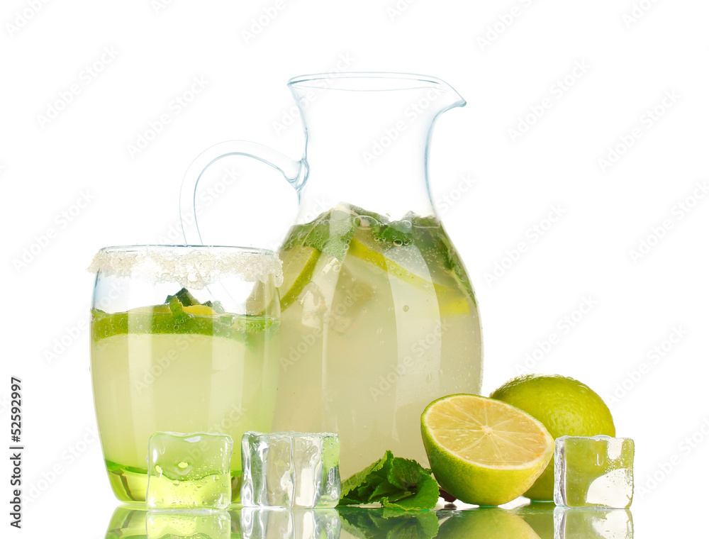 Lemonade in pitcher and glass isolated on white Lemonade in pitcher and glass isolated on white
