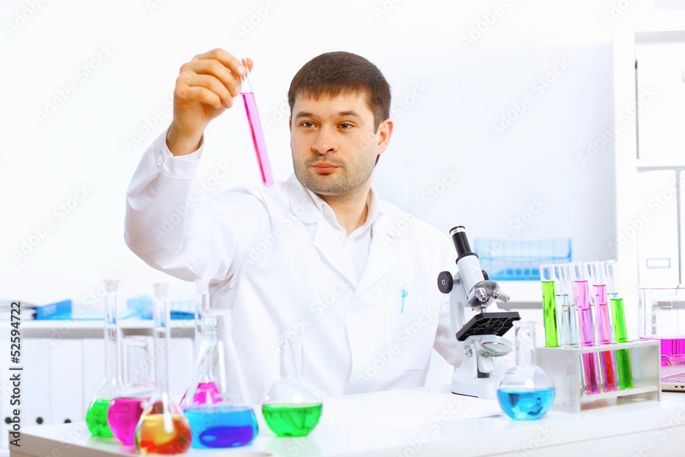 Young male scientist working in laboratory