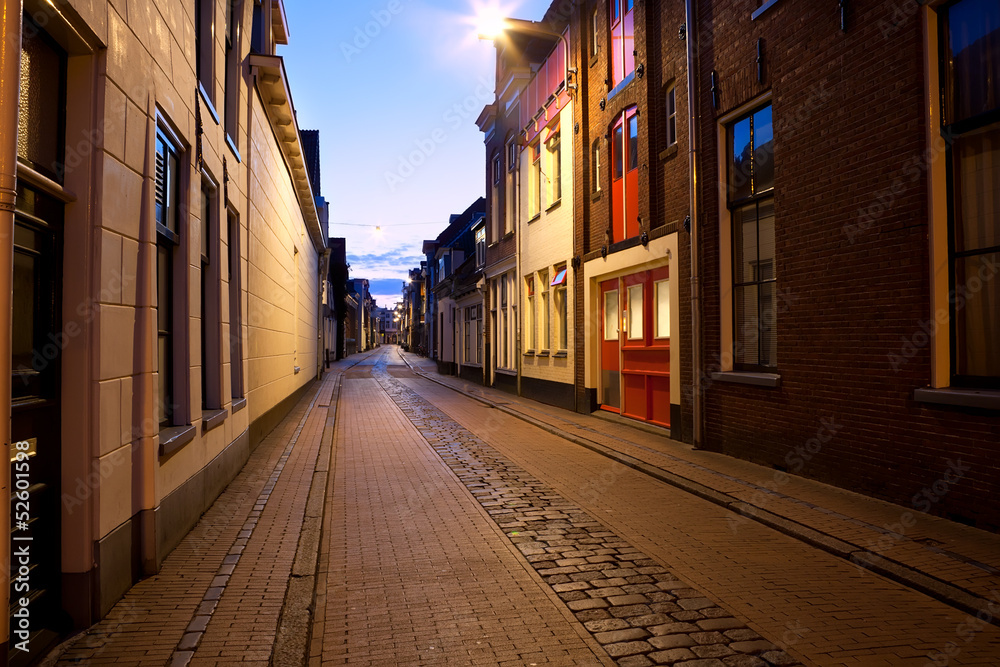 long street at night in Groningen, Netherlands