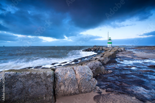Photos lighthouse on North sea coast, Ijmuiden, Holland