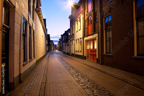 long street at night in Groningen, Netherlands