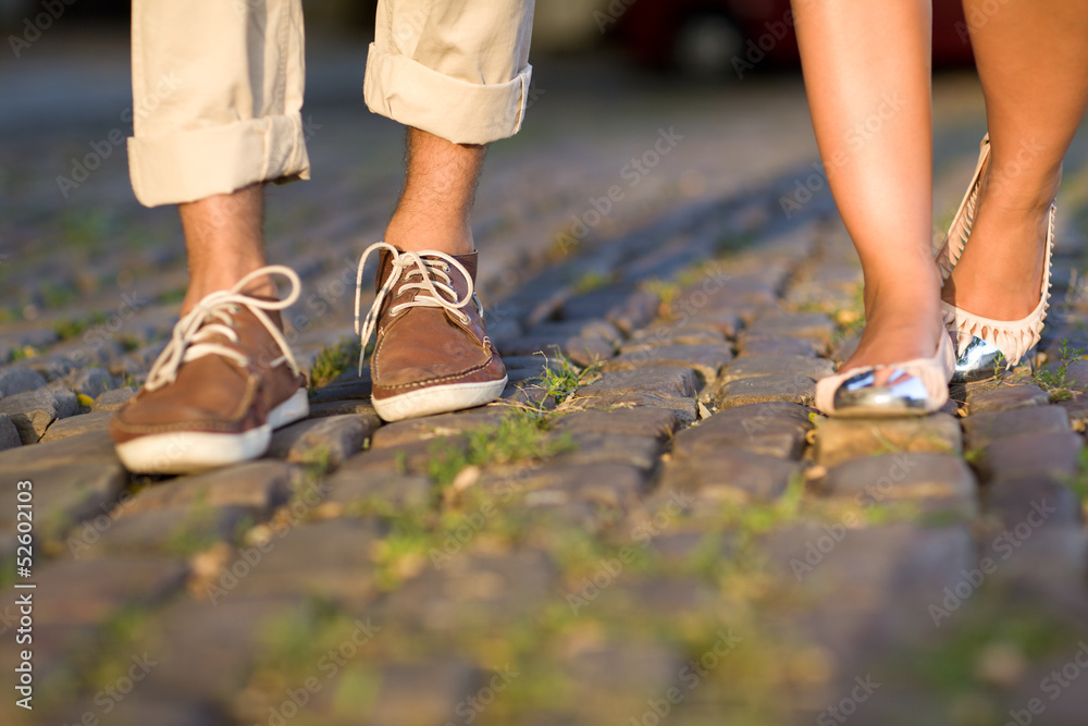 Male and female legs during a date