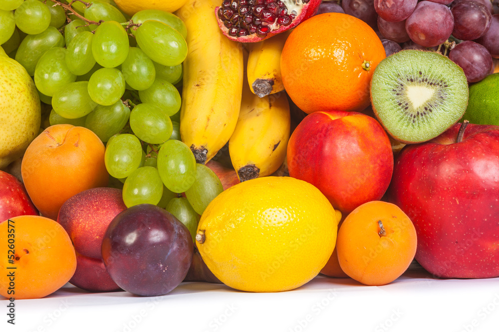 Huge group of fresh fruits isolated on a white background.