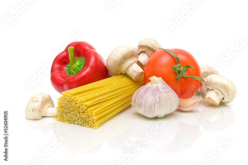 spaghetti, mushrooms and vegetables on a white background
