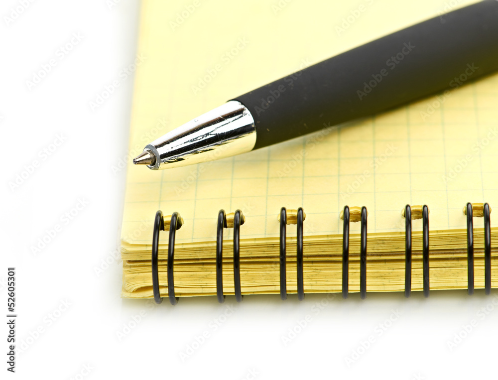 notepad and pen isolated on white background notepad and pen isolated on white background