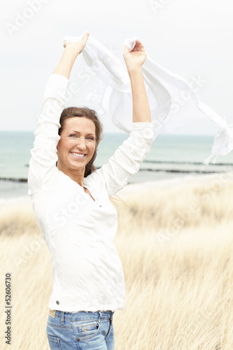 Woman enjoying sea breeze