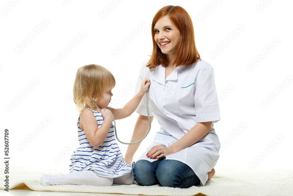 Female doctor and small patient. Pediatrics. . Female doctor and small patient. Pediatrics. .