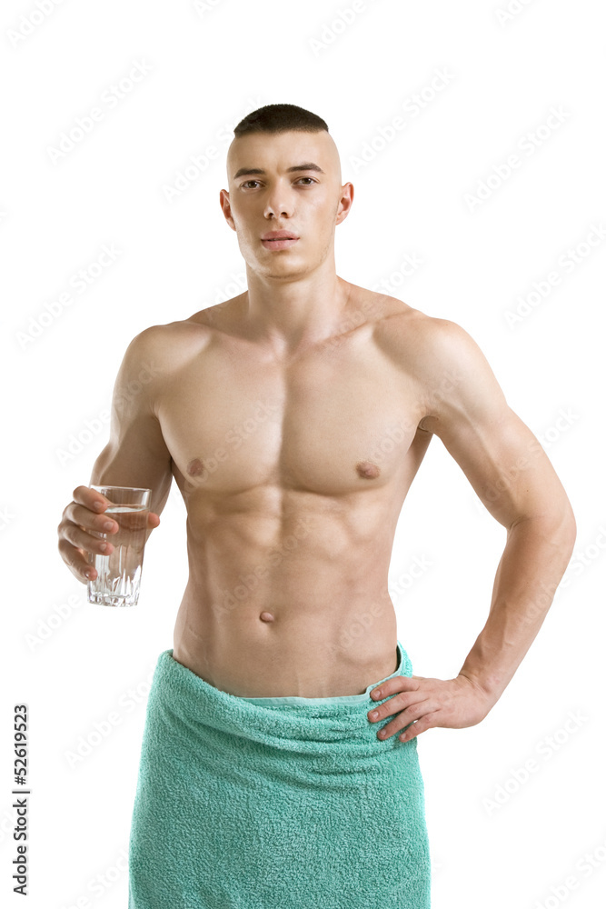 Fototapeta premium athletic young man with glass of fresh water