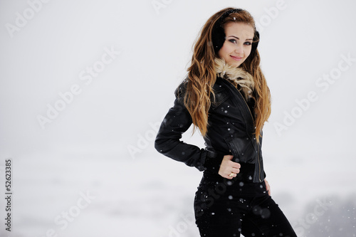 Portrait of beautiful naked girls sheltered in soft black materi