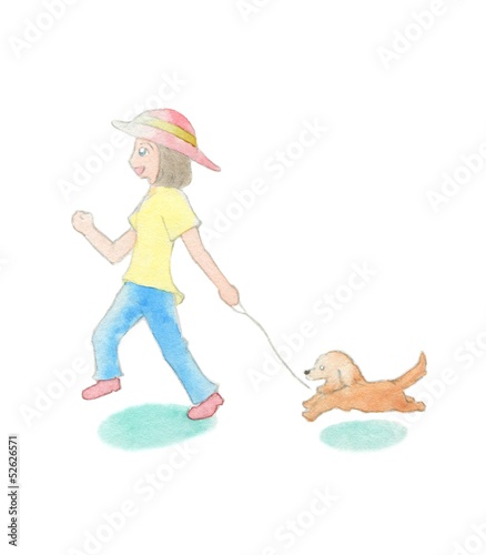 犬の散歩をする女性