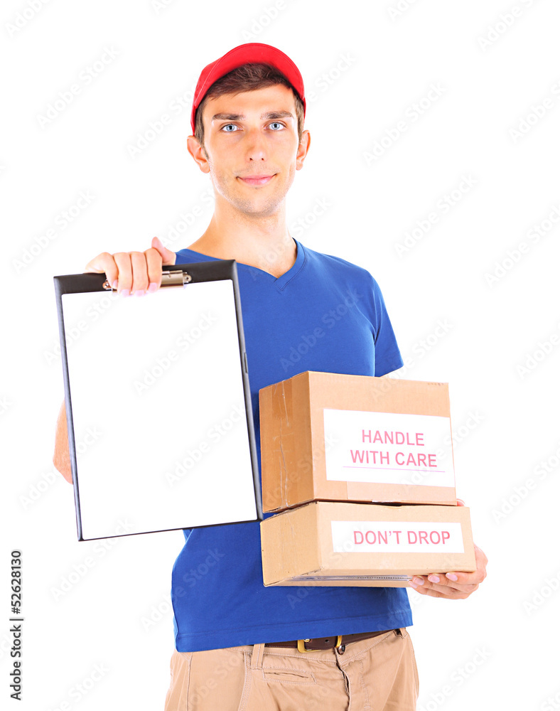 Young delivery man holding parcels and clipboard, isolated Young delivery man holding parcels and clipboard, isolated