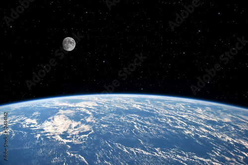 Moon over Earth. Elements of this image furnished by NASA.