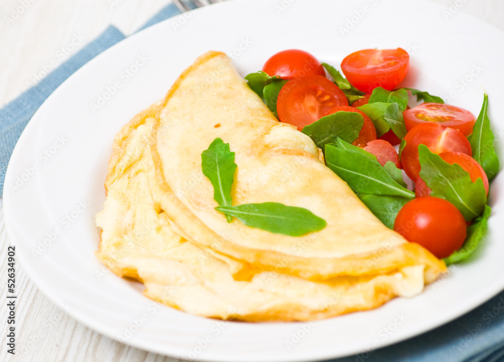 Omelet with vegetable salad