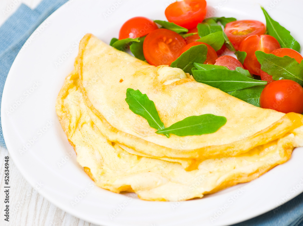 Omelet with vegetable salad