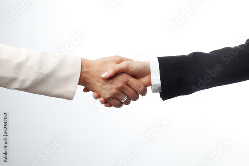 Close-up of two businesswomen shaking hands