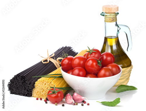 Italian food  - spaghetti, tomatoes, basil, olive oil, garlic