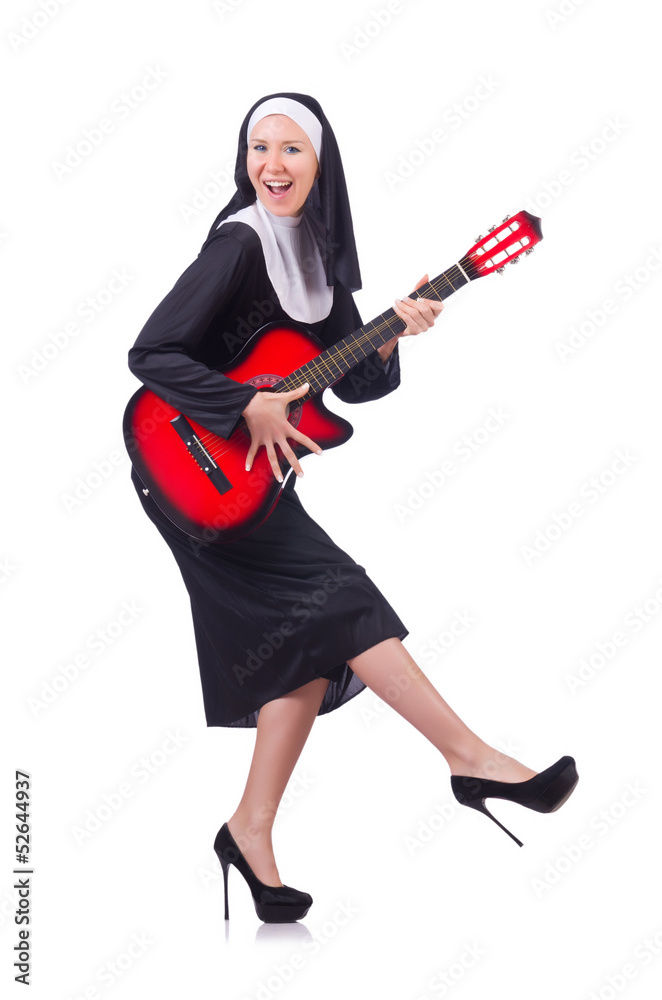Nun playing guitar isolated on white Nun playing guitar isolated on white