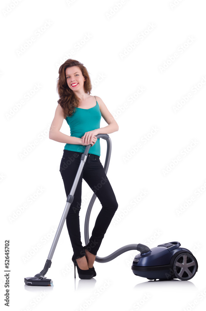 Young woman with vacuum cleaner on white Young woman with vacuum cleaner on white