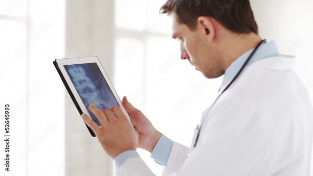 doctor working with x-ray scan on tablet pc doctor working with x-ray scan on tablet pc