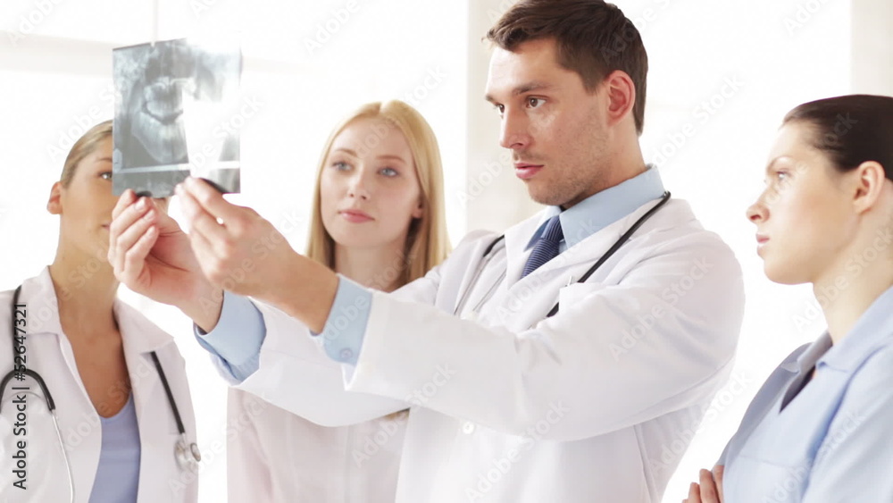 two doctors with x-ray prints two doctors with x-ray prints