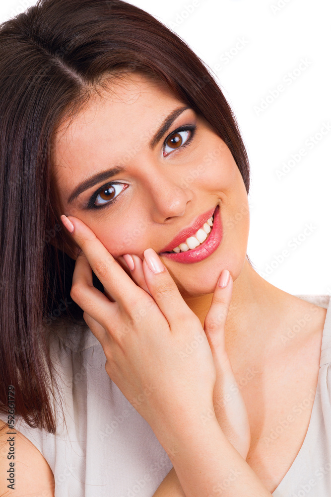 Young beautiful woman touching her face isolated Young beautiful woman touching her face isolated