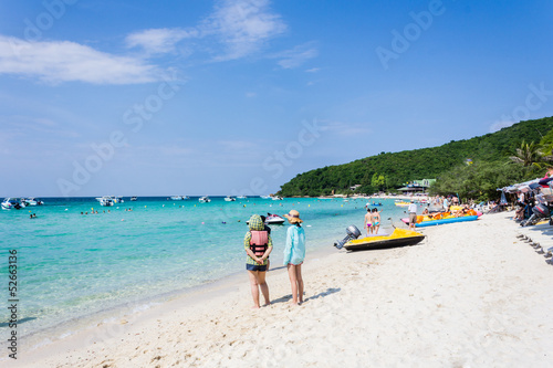 Tourist on the beach looking to the sea