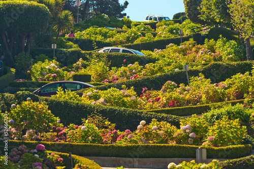 Lombard street with cars in San Francisco. photo