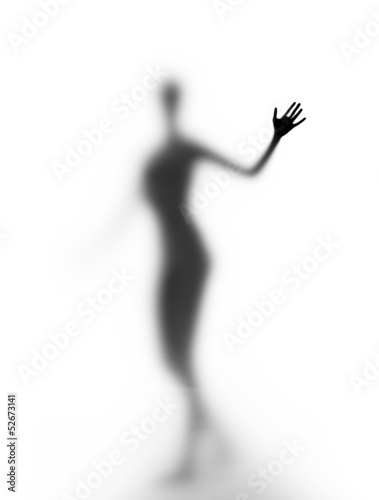 A silhouette of a young woman