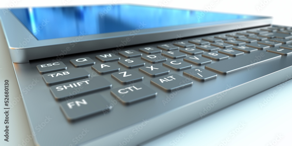 Obraz premium Tablet PC with a retractable keyboard.