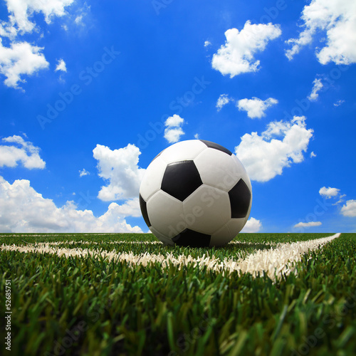 soccer ball on the green field