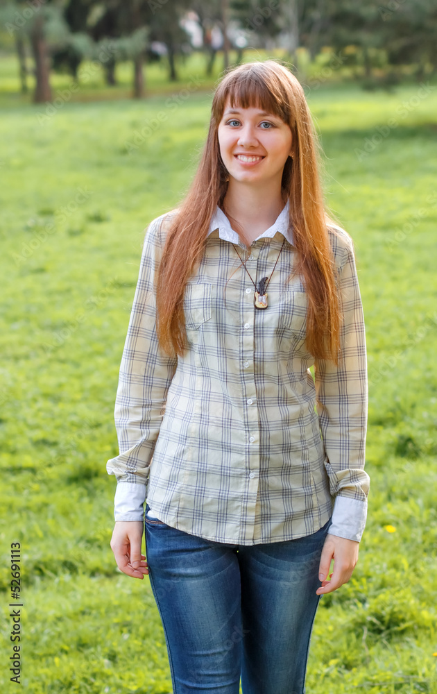 Obraz premium The girl on a green background.