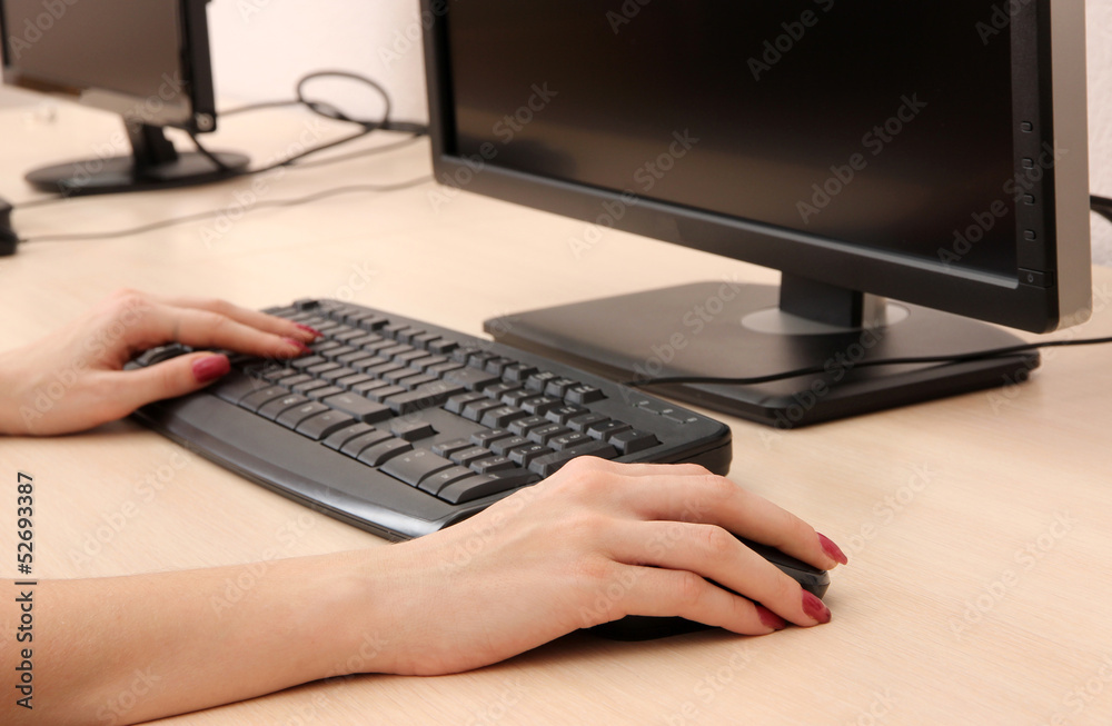 Female hands typing on keyboard Female hands typing on keyboard