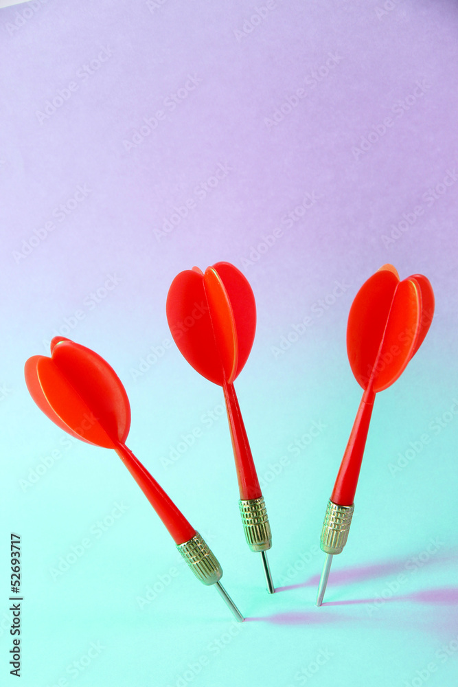 Darts on blue background