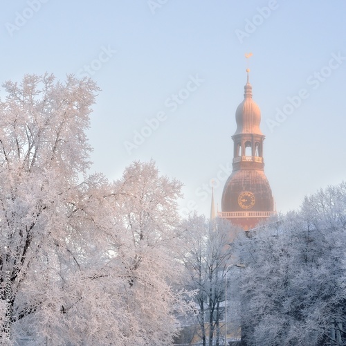 Dome church in Riga and hoar frost on trees by morning, Latvia