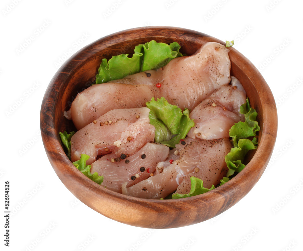 Chicken meat in wooden bowl isolated on white Chicken meat in wooden bowl isolated on white