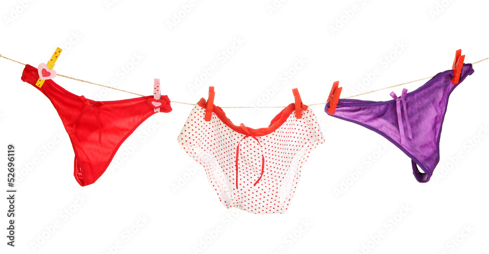 Women's panties hanging on rope isolated on white Women's panties hanging on rope isolated on white