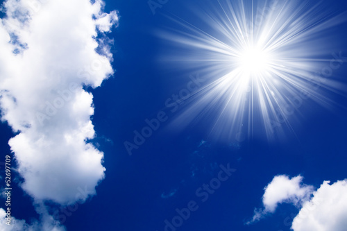 Blue sky with clouds and sun. White clouds in blue sky © EwaStudio
