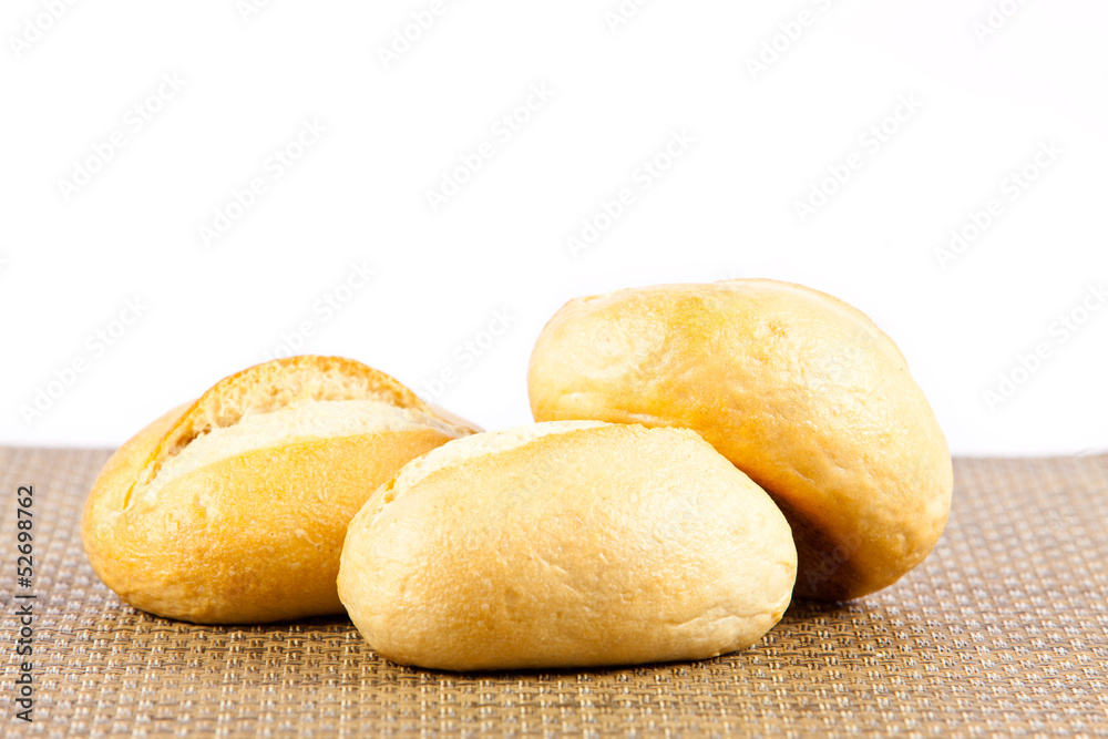 Bread on a white background. delicious buns isolated on white Bread on a white background. delicious buns isolated on white