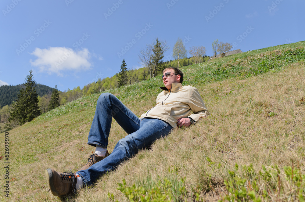 Man enjoying the mountain sunshine